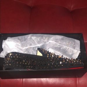 black loafers wit gold spikes